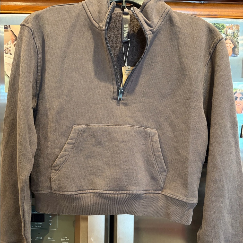 SKIMS Women's French Terry Shrunken Half zip sweatshirt. Official color is iron.